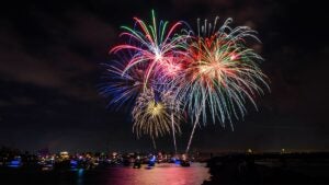 boats on water with colorful fireworks in sky at 2021 New Years Eve Fireworks Marina del Rey in Los Angeles, California, USA